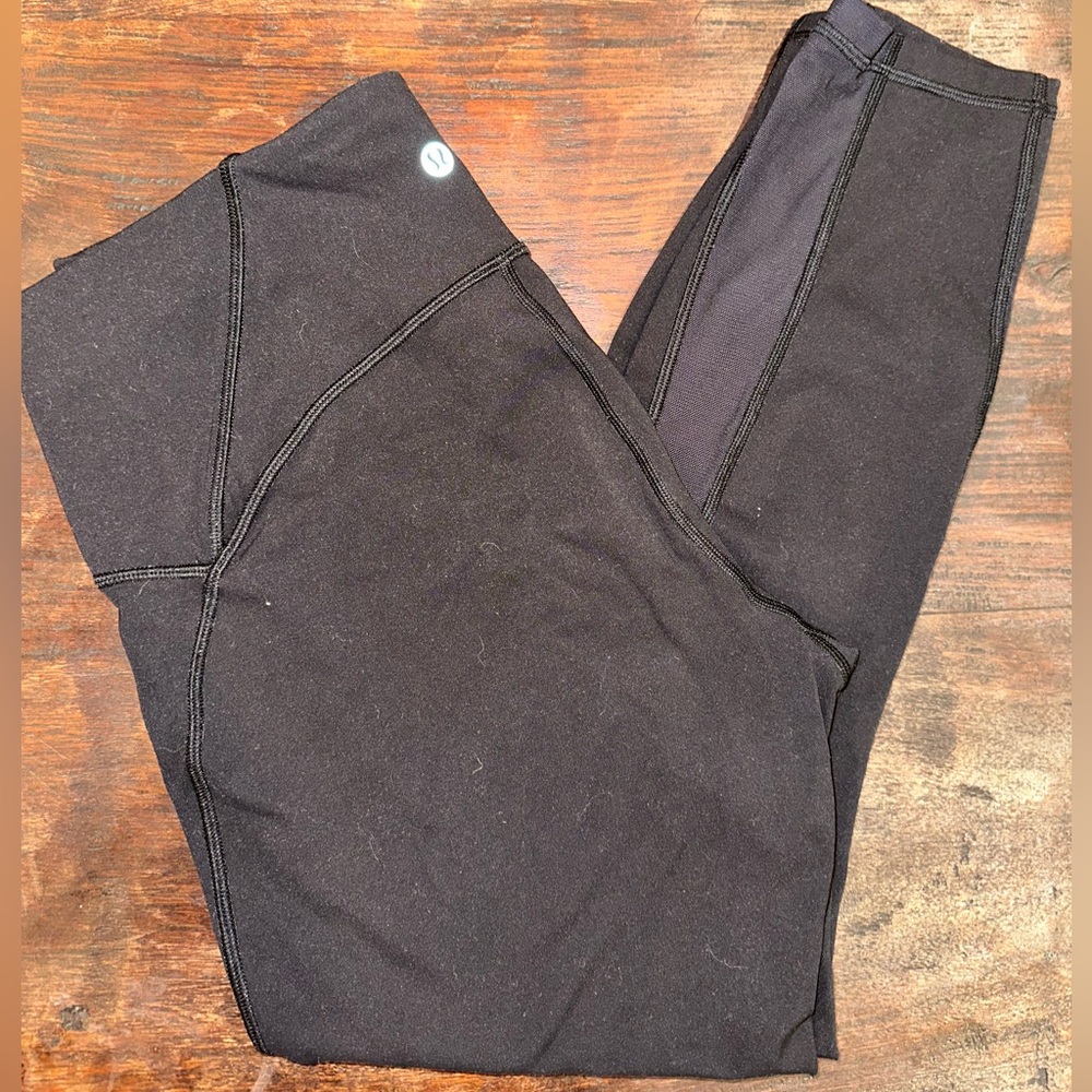 Lululemon leggings, size 10. Mesh cutouts on calf.